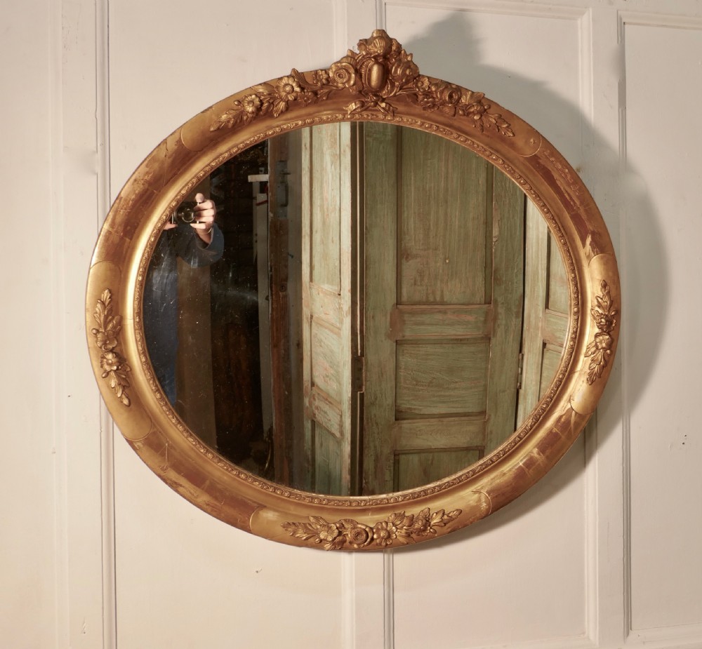 A Large French Rococo Oval Gilt Wall Mirror View IX