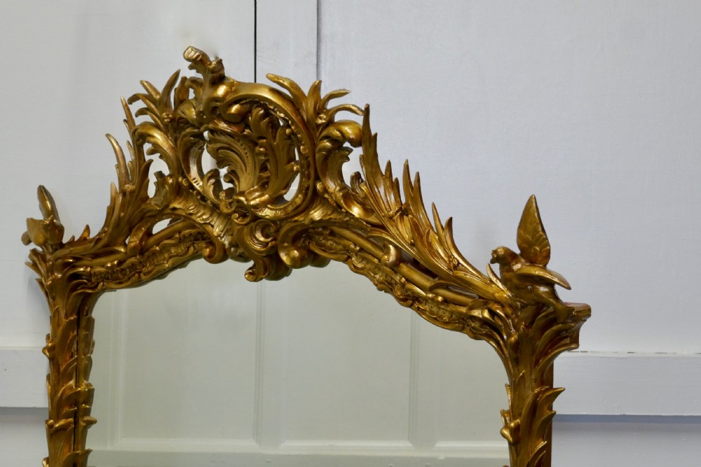 A Large Elaborate French Rococo Gilt Console Mirror Decorated with Leaves and Birds View V