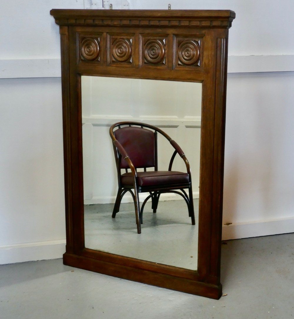 A Large French Carved Oak Wall Mirror