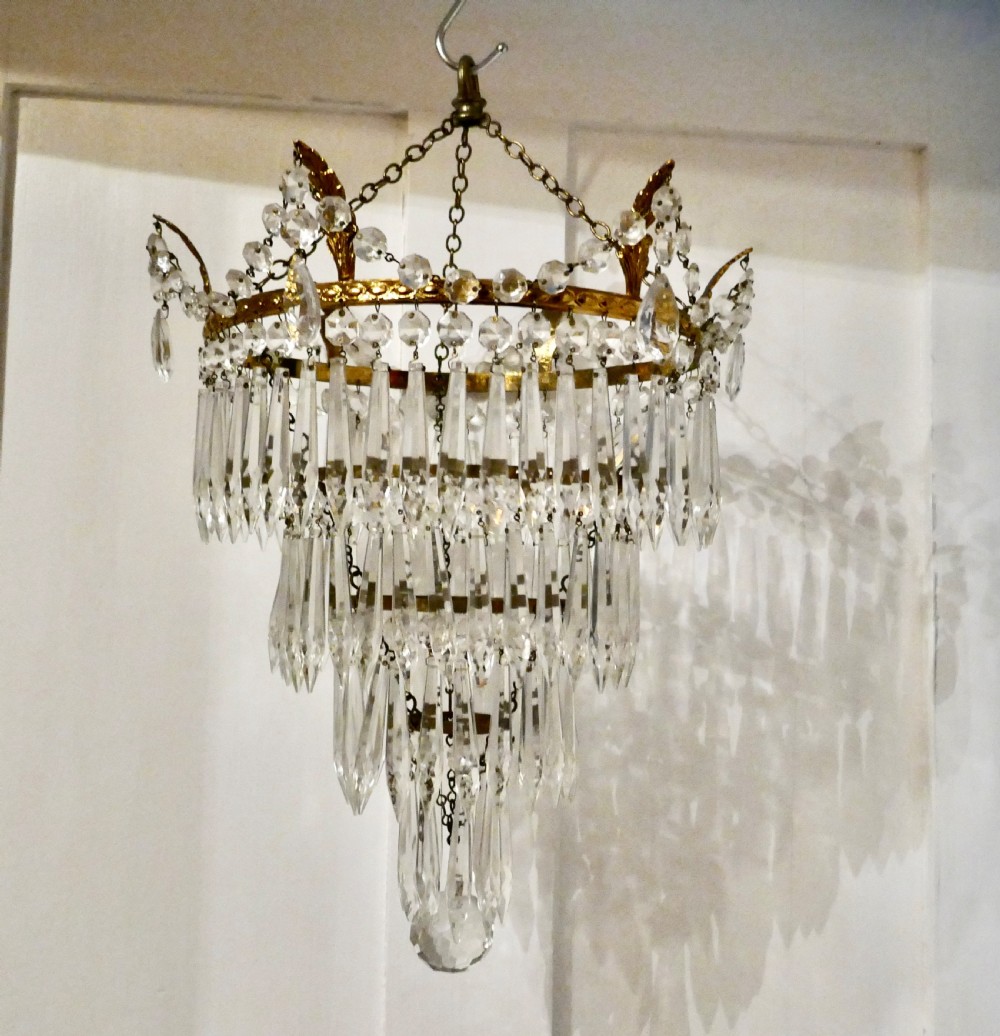 A Pair of Large Crystal Waterfall Chandeliers View II