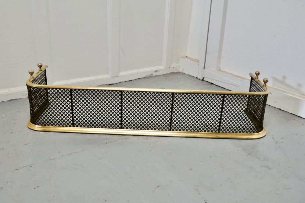 A Victorian Brass and Iron Fender or Fireguard