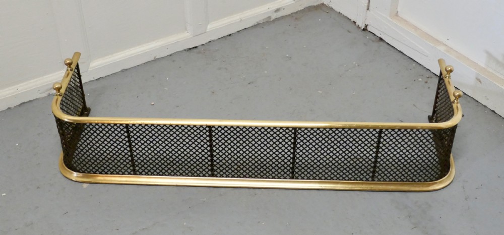 A Victorian Brass and Iron Fender or Fireguard View II