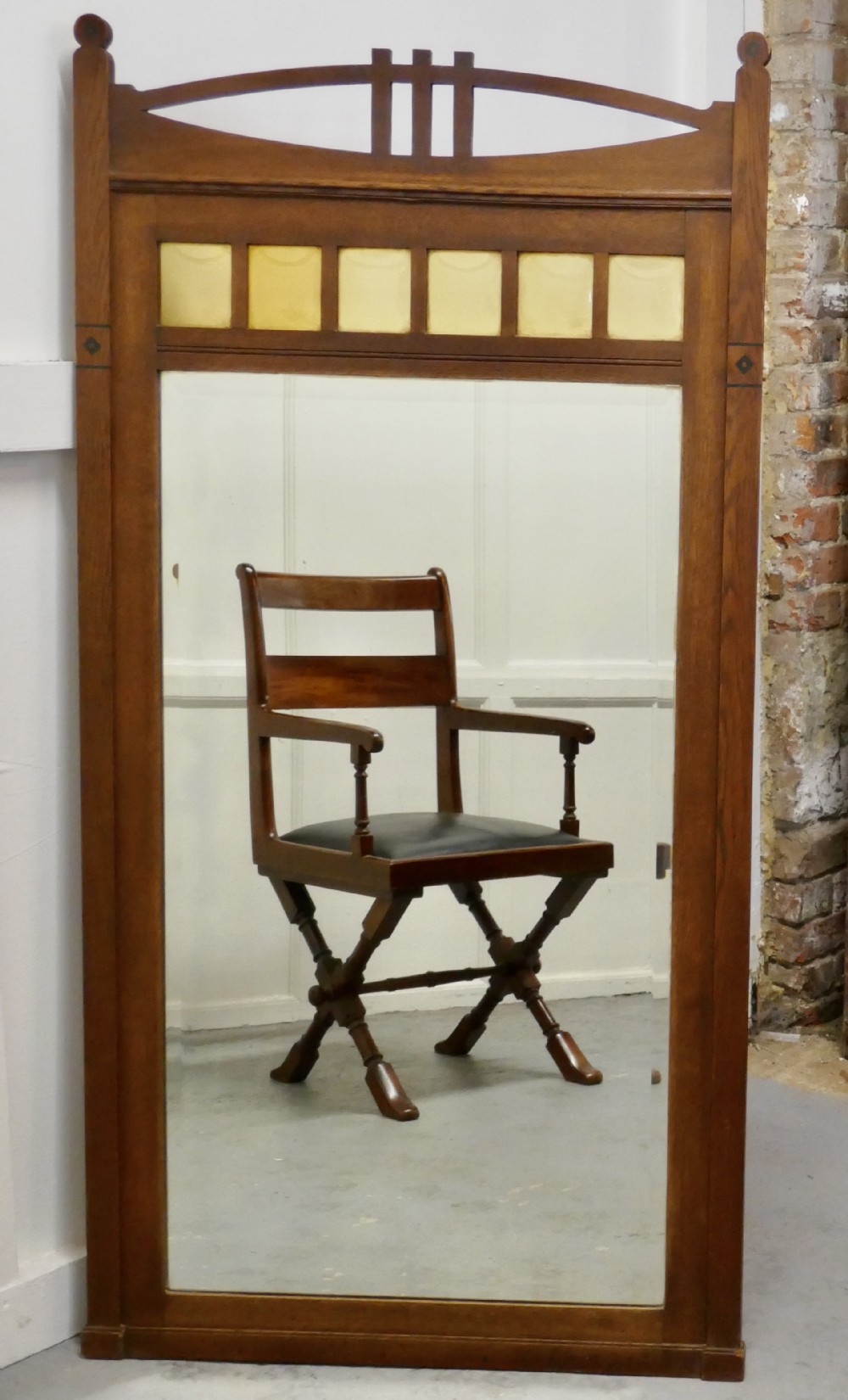 A Tall Golden Oak Arts and Crafts Console Mirror