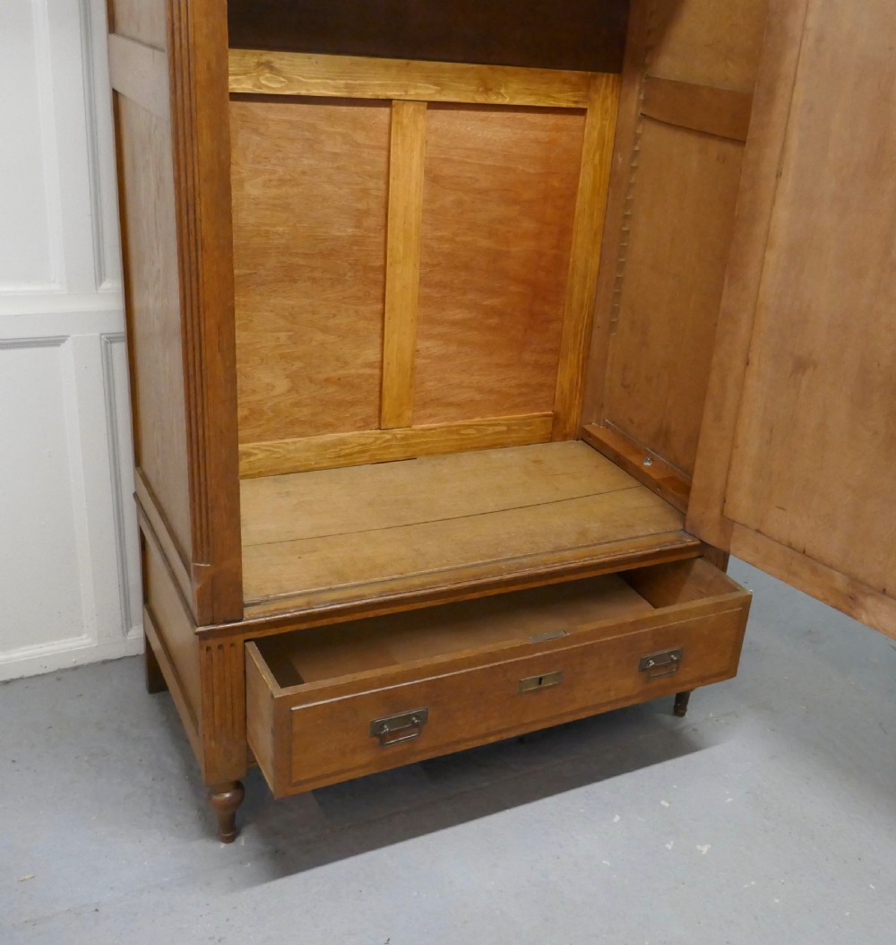 A Victorian Arts and Crafts Golden Oak Mirrored Wardrobe View IX