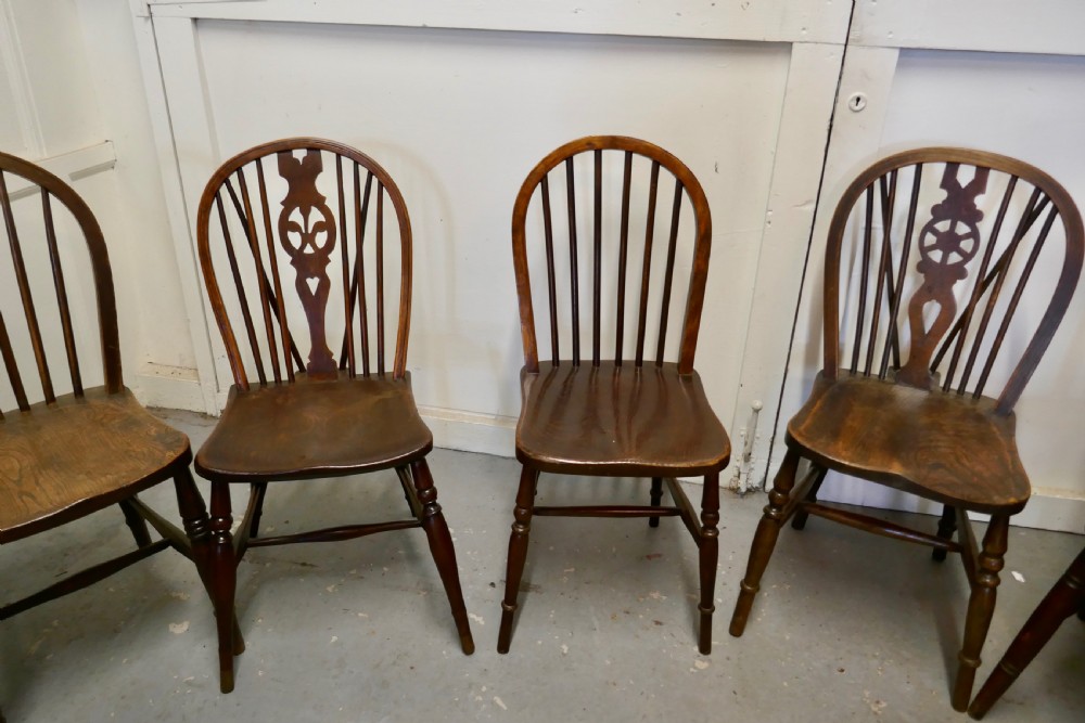 A Collection of 8 Beech and Elm Country Windsor Chairs View V