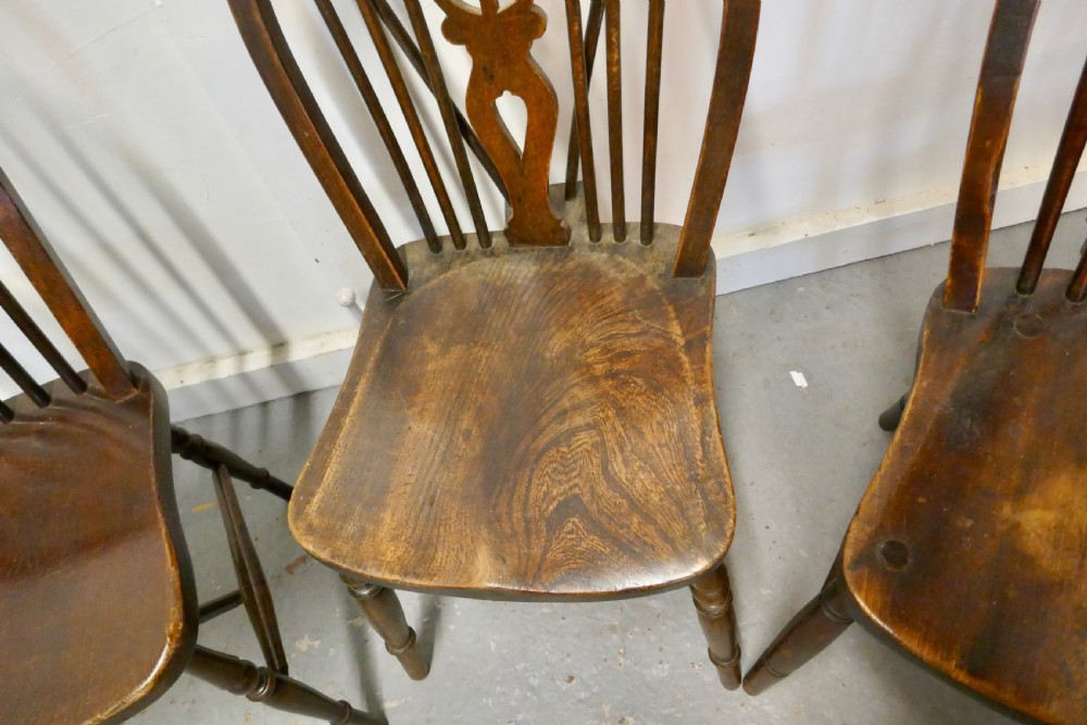 A Collection of 8 Beech and Elm Country Windsor Chairs View VII