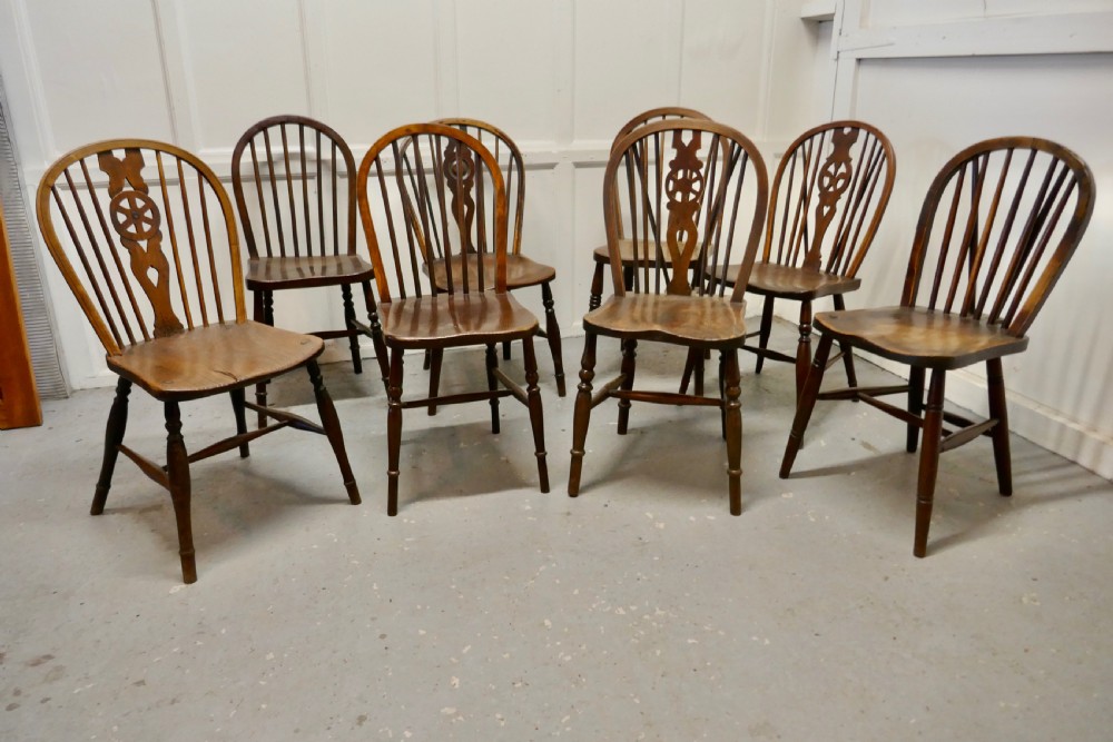 A Collection of 8 Beech and Elm Country Windsor Chairs View IX