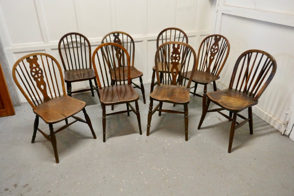 A Collection of 8 Beech and Elm Country Windsor Chairs View X
