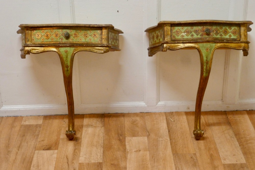 A Pair of French Gilt and Painted Wall Console Tables