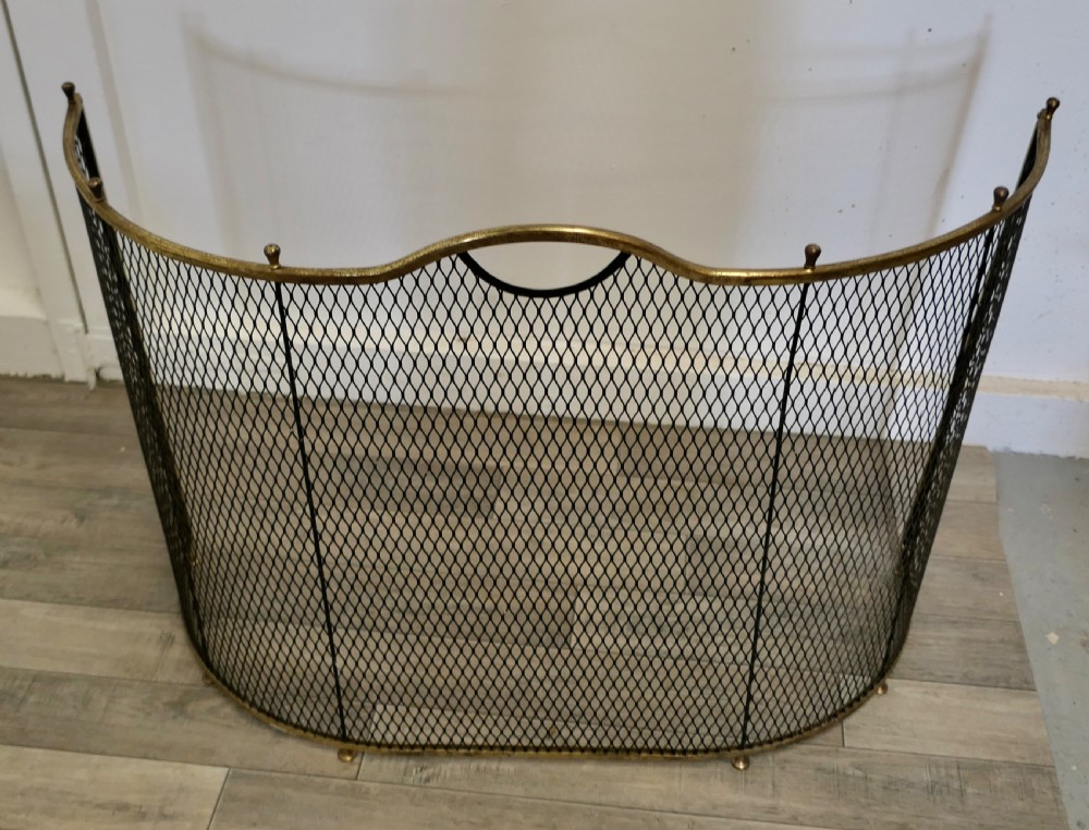 A Victorian Curved Brass and Iron Nursery Fire Guard View IV