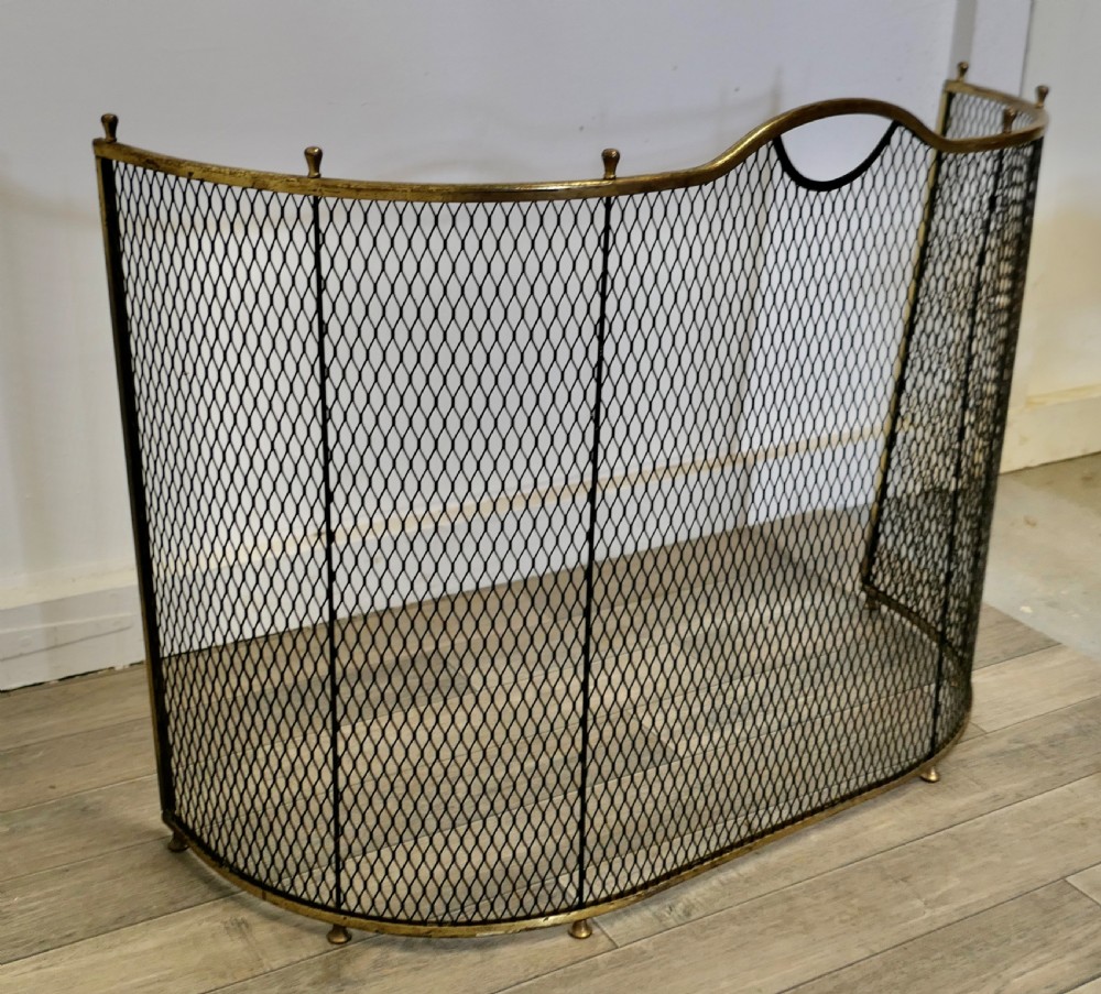 A Victorian Curved Brass and Iron Nursery Fire Guard View VI