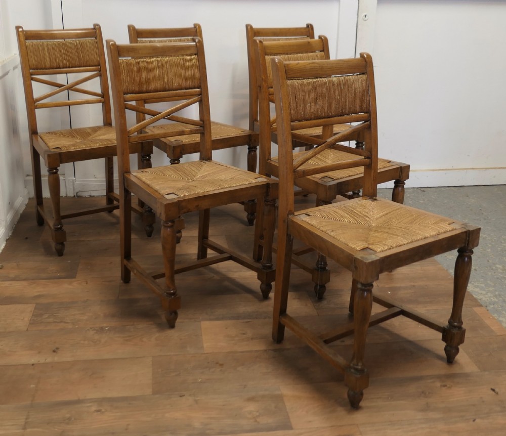 A Set of 6 French Golden Oak Country Dining Chairs  View II