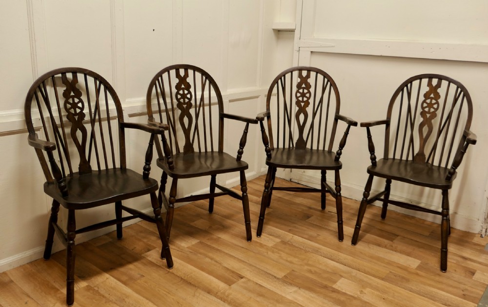 Set of 4 Beech and Elm Wheel Back Carver Chairs