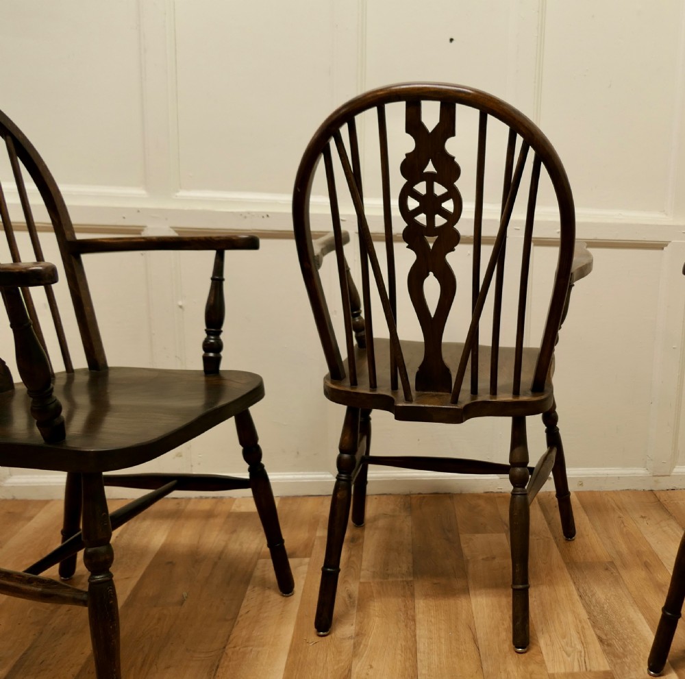 Set of 4 Beech and Elm Wheel Back Carver Chairs View V
