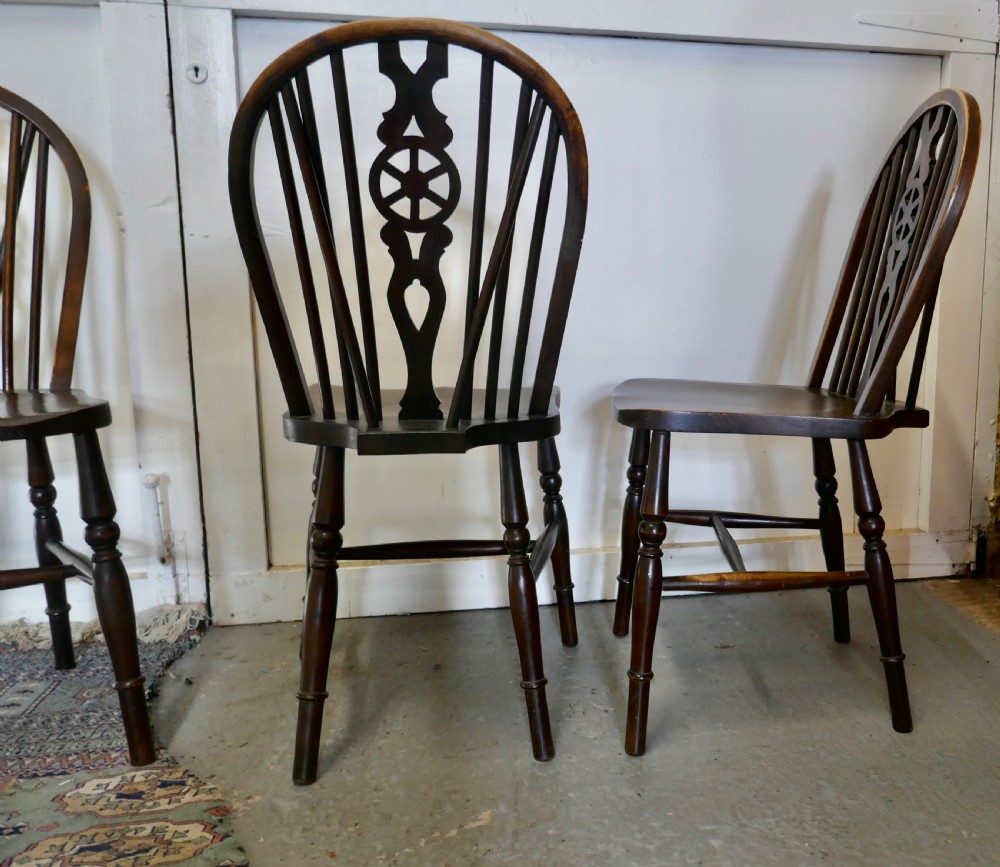 A Set of 4 Beech & Elm Wheel Back Windsor Kitchen Dining Chairs View IV