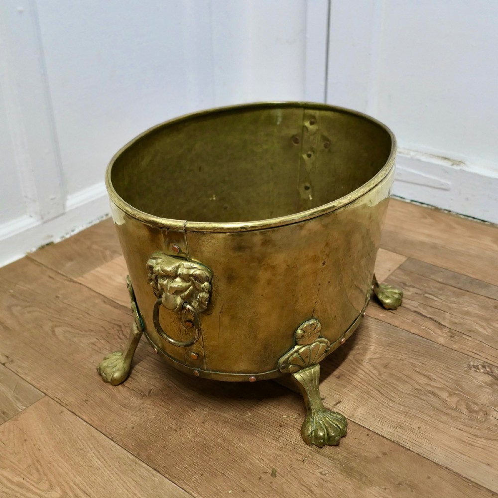 19th Century Oval Brass Lions Mask Log Bin   View II