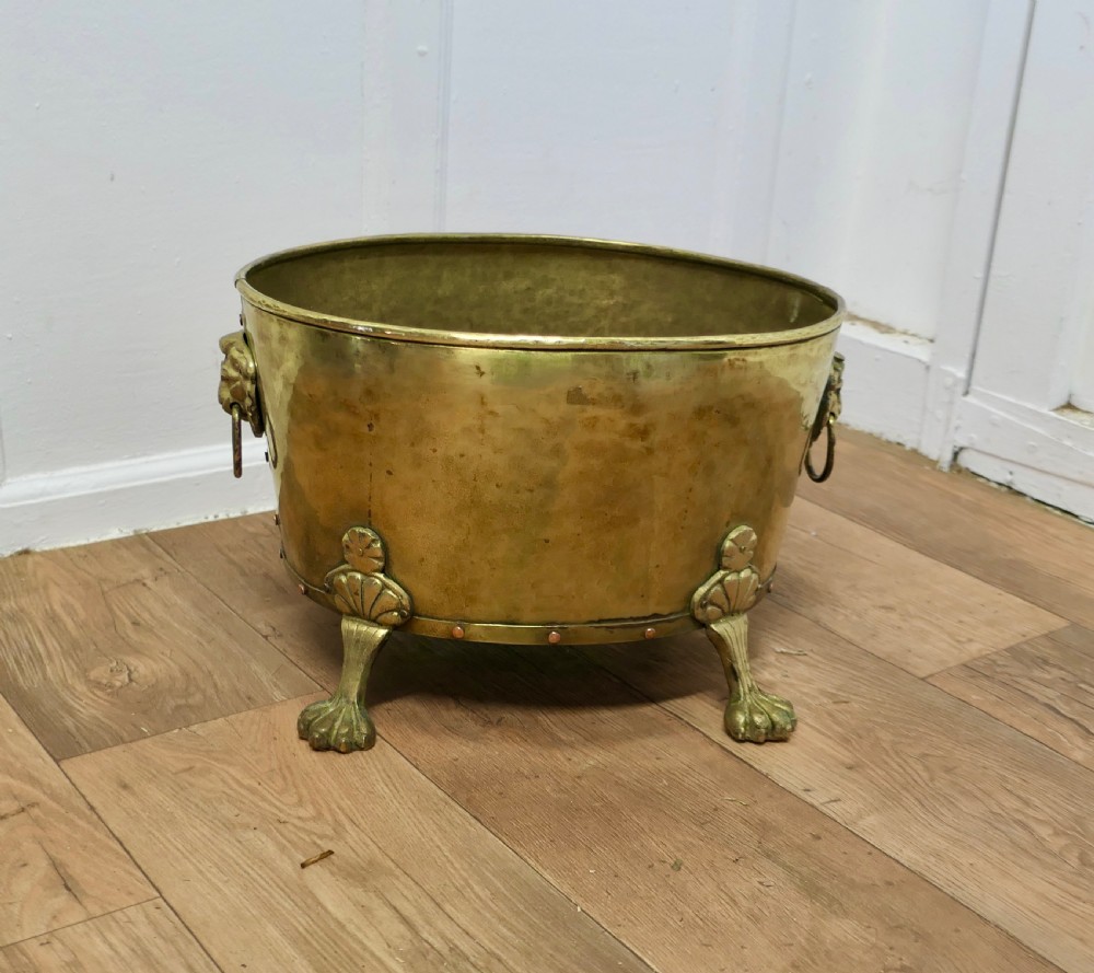 19th Century Oval Brass Lions Mask Log Bin   View V