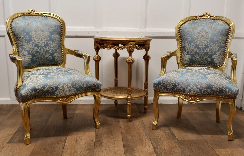 A Superb Pair of French 19th Century Gilt Salon Chairs