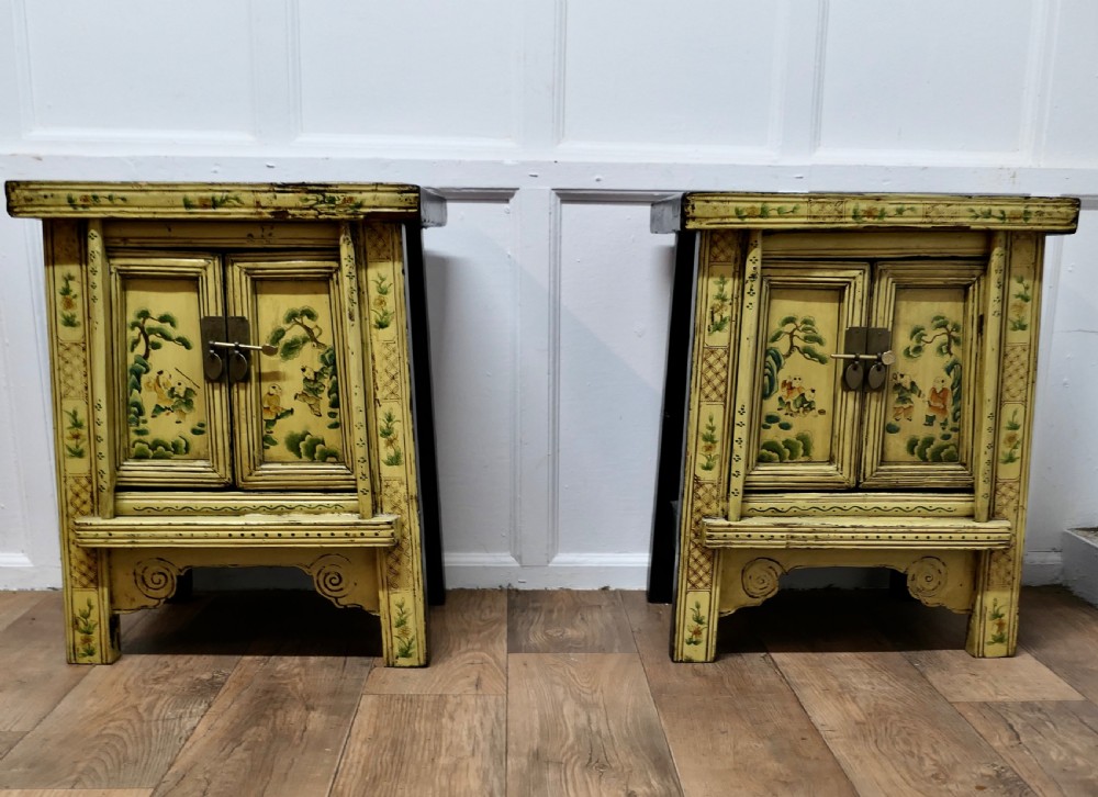 A Superb Pair of Cream Lacquered Chinoiserie Decorated Cabinets. 