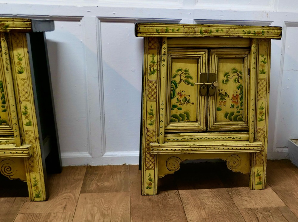 A Superb Pair of Cream Lacquered Chinoiserie Decorated Cabinets.  View III