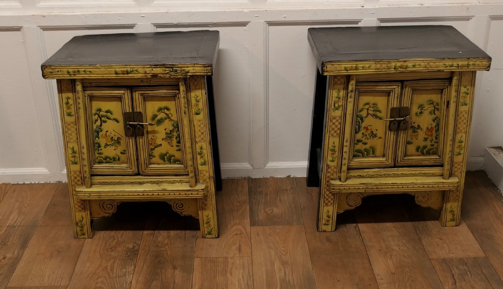 A Superb Pair of Cream Lacquered Chinoiserie Decorated Cabinets.  View IV