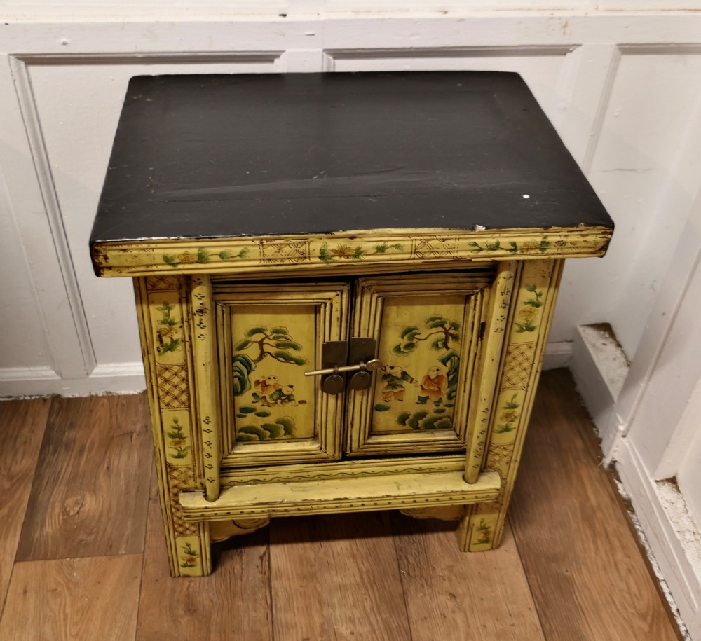A Superb Pair of Cream Lacquered Chinoiserie Decorated Cabinets.  View VI