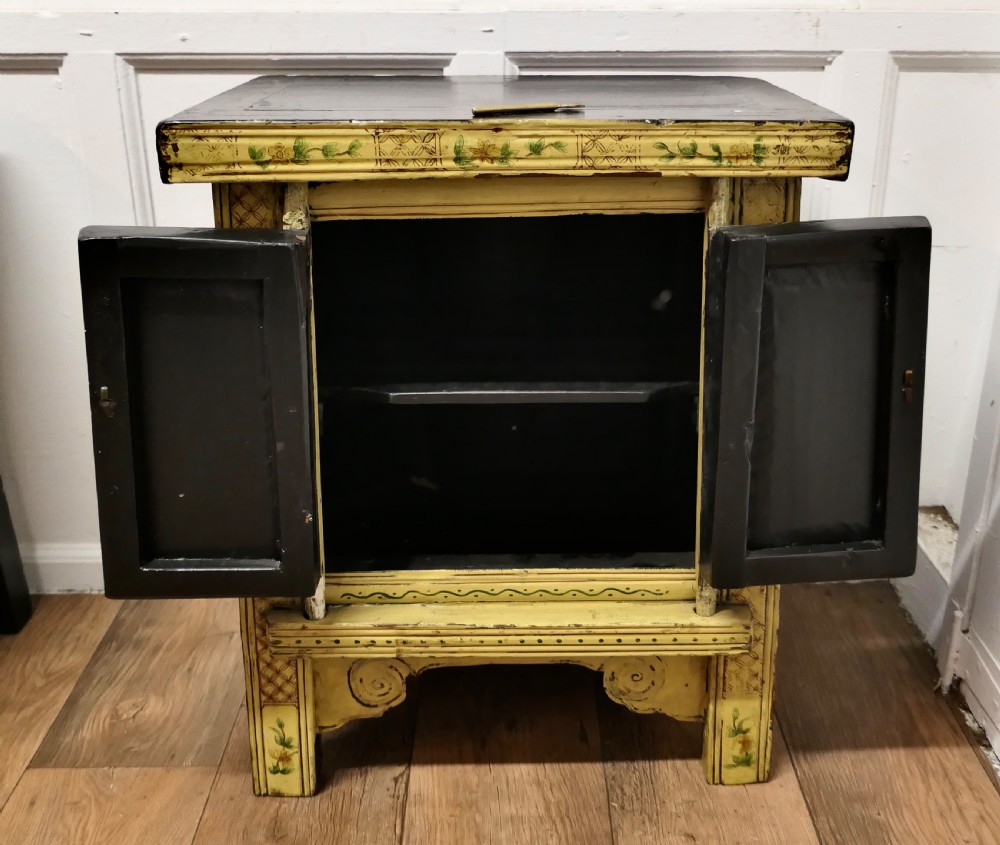 A Superb Pair of Cream Lacquered Chinoiserie Decorated Cabinets.  View VII