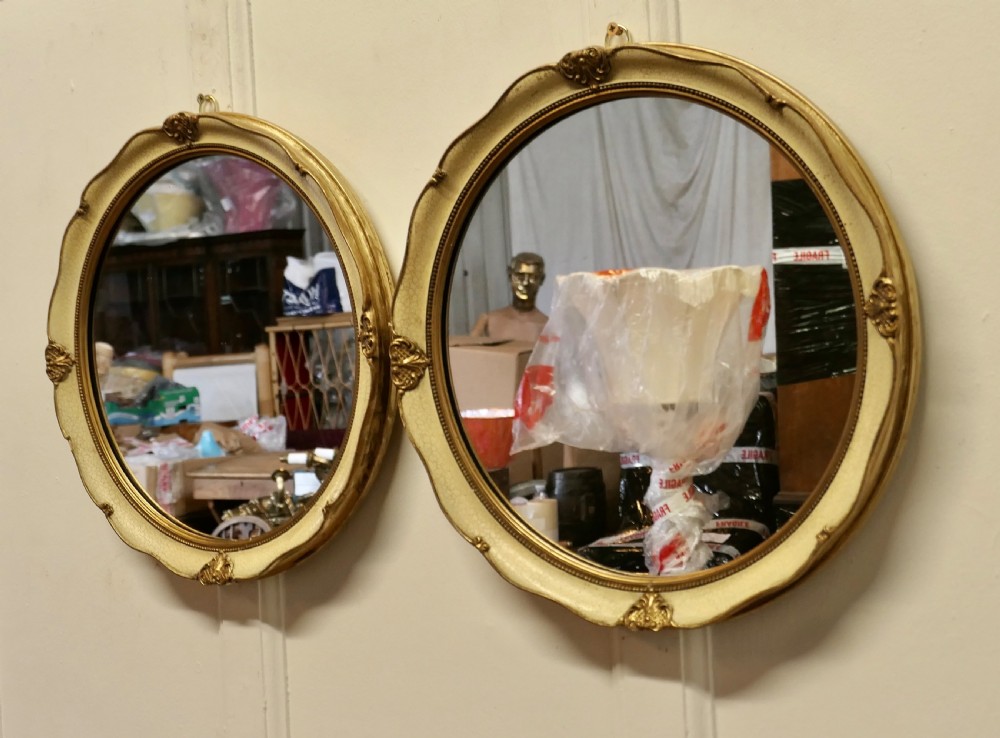 A Pair of French Gilt and Cream Crackle Finish Wall Mirrors View IV