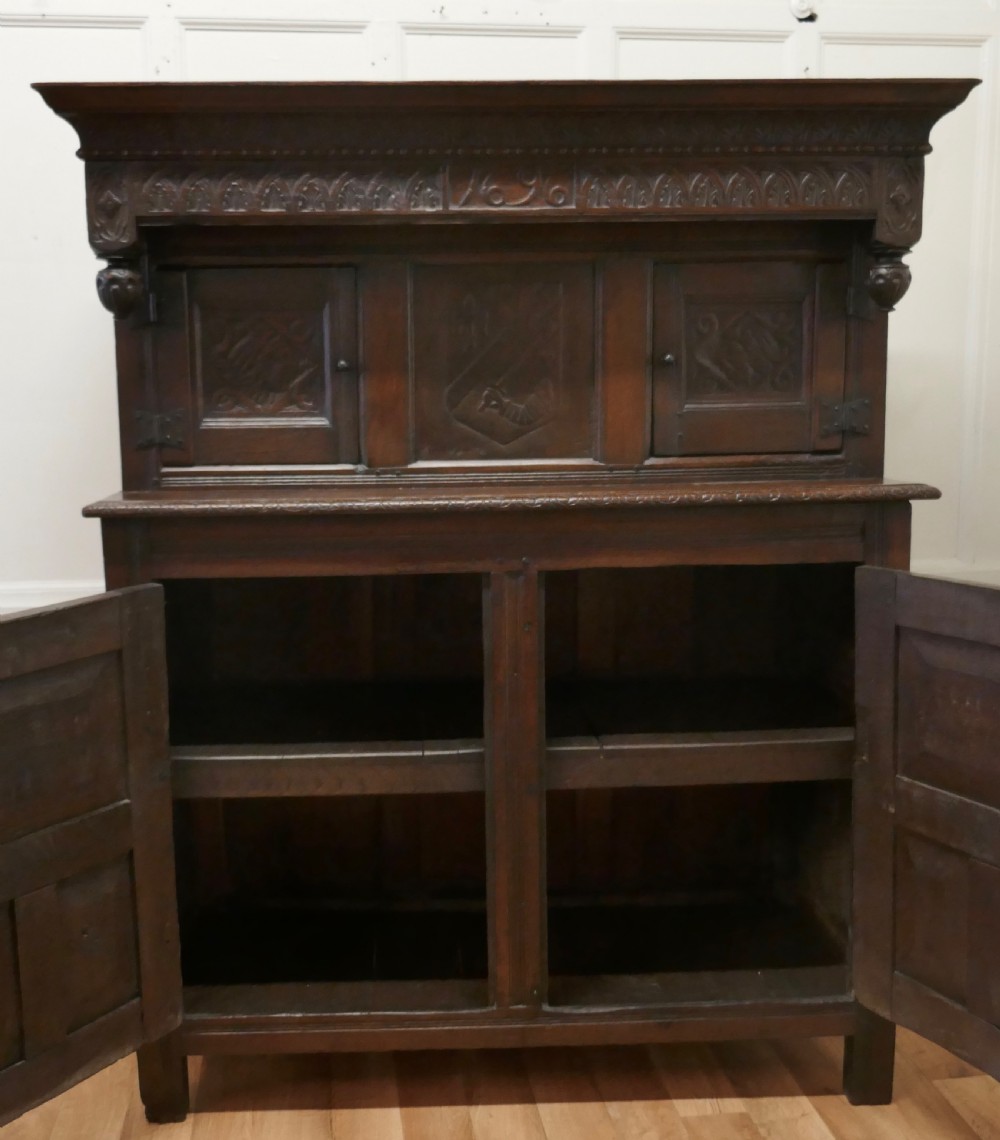 1696 French Carved Oak Court Cupboard, Cottage size Livery Cupboard  View XIV