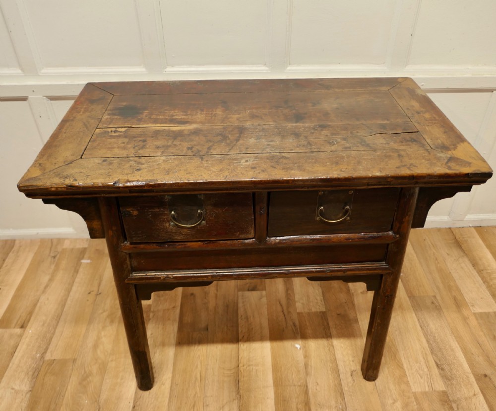 A dark brown lacquered wooden Chinese side table featuring two drawers with brass handles and straight legs. View II