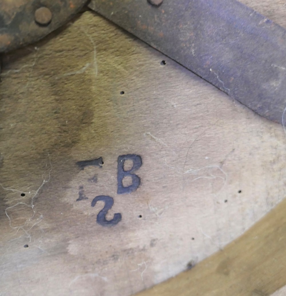 A cylindrical 19th-century French wooden grain measure reinforced with metal bands and stamped with the words DOUBLE DECALITRE. View VI