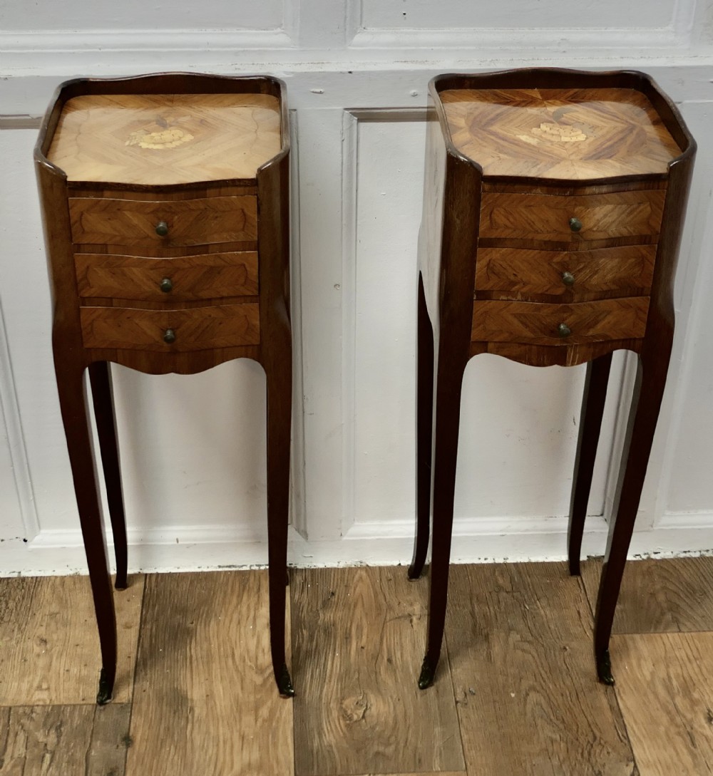A Pair of Dainty French Four Drawer Side Cabinets