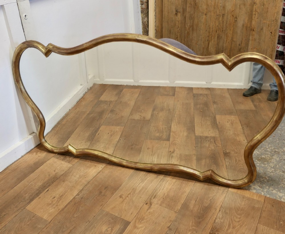 A Superb Very Large Italian Gilt Scallop Shaped Mirror View IV