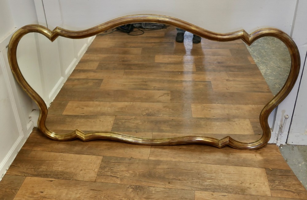 A Superb Very Large Italian Gilt Scallop Shaped Mirror View VIII