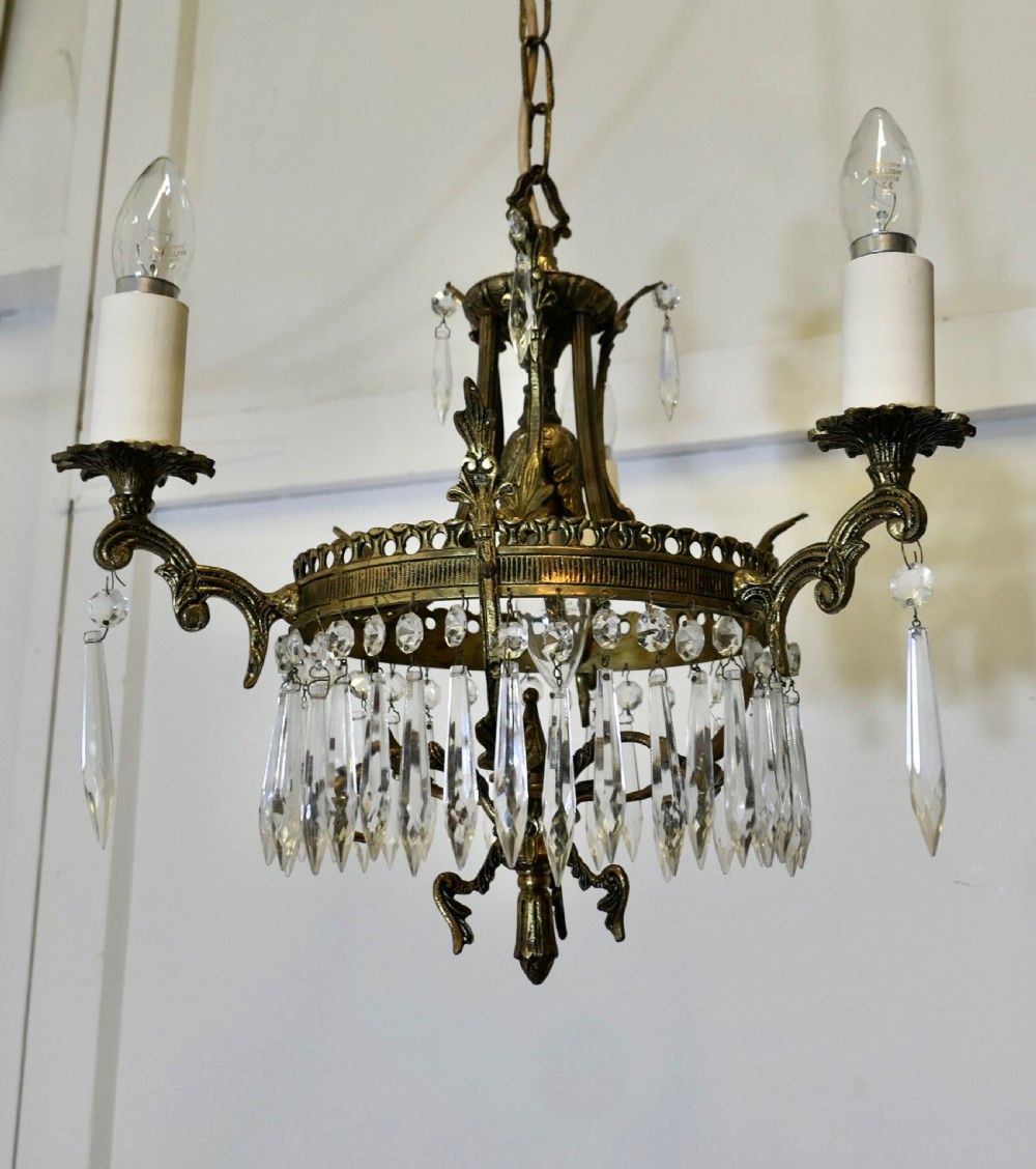 A Stunning 3 Branch Brass and Crystal Chandelier  View VIII