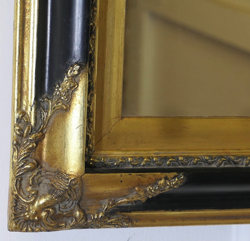 An Elegant Regency Gilt and Black Wall Mirror View III