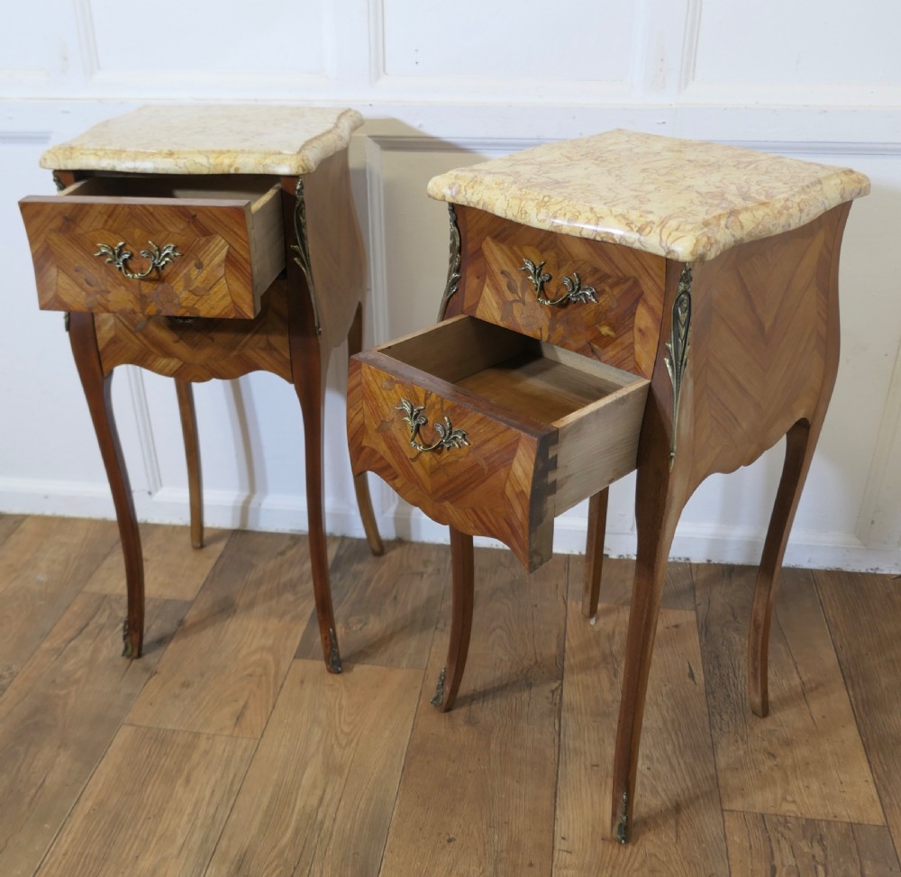 A Pair of French Marquetry Bombe Bedside Cabinets View III