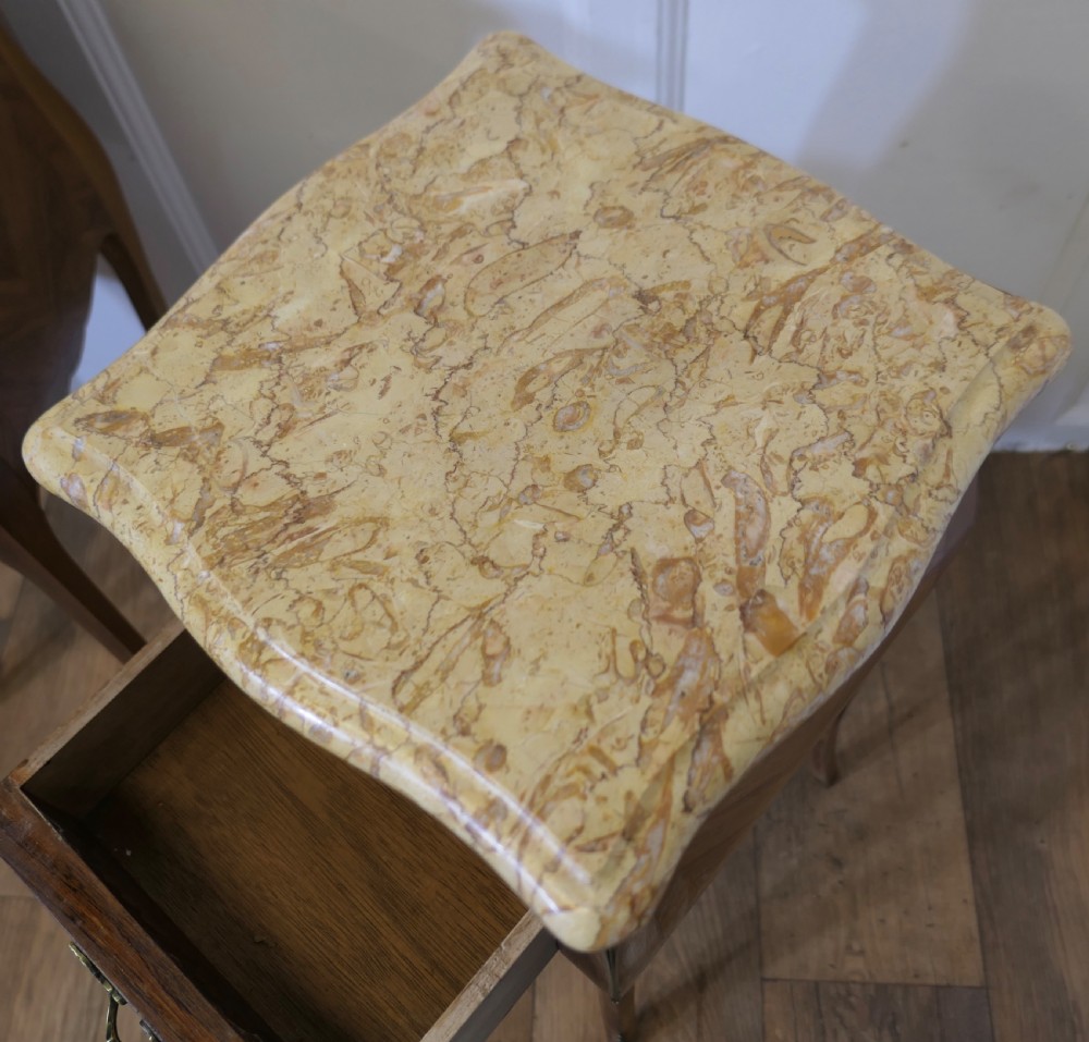 A Pair of French Marquetry Bombe Bedside Cabinets View IV