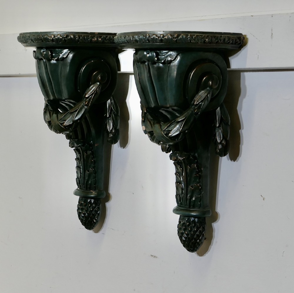 A Pair of 19th Century Green Wall Brackets