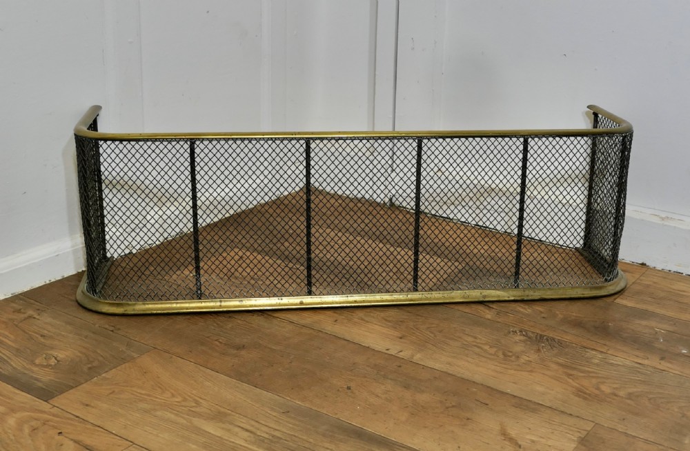 A Victorian Brass and Iron Fender or Fire Guard