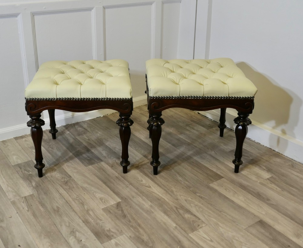 A Pair of Chesterfield Buttoned Leather Walnut Library Window Stools View II