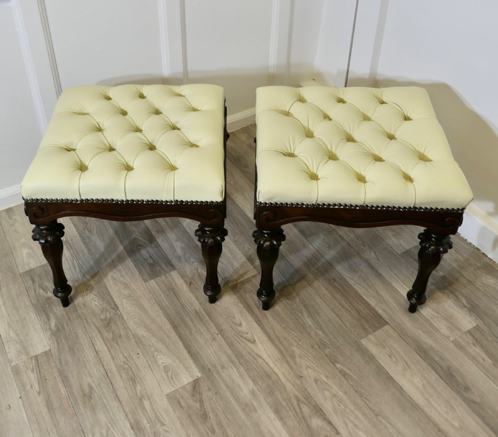 A Pair of Chesterfield Buttoned Leather Walnut Library Window Stools View III