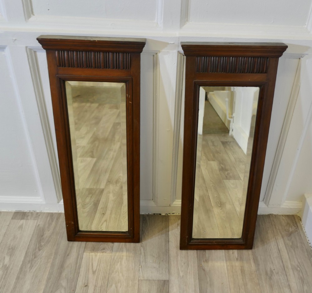 A Pair of Narrow Edwardian Walnut Mirrors View V