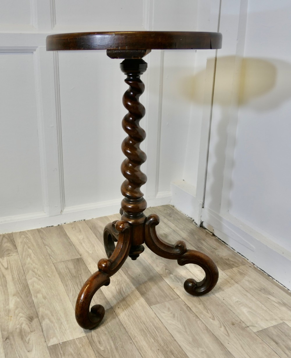 A Victorian dark wood circular wine table featuring a barley twist column and a scrolled tripod base. View II