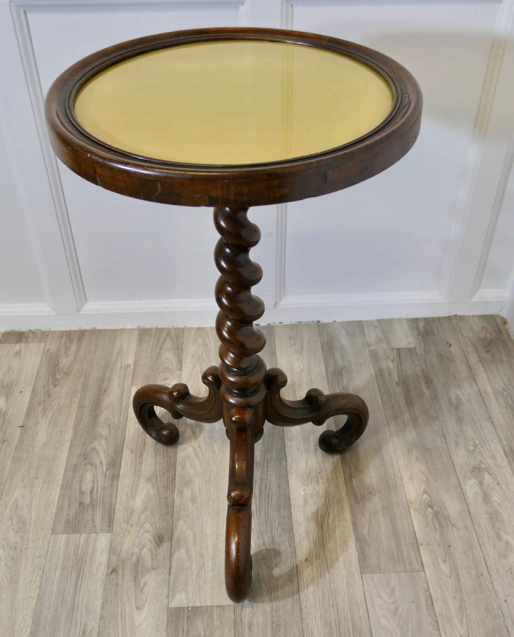 A Victorian dark wood circular wine table featuring a barley twist column and a scrolled tripod base. View III