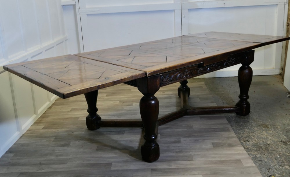  
9ft, 19th Century Carved and Marquetry Oak Draw Leaf Table