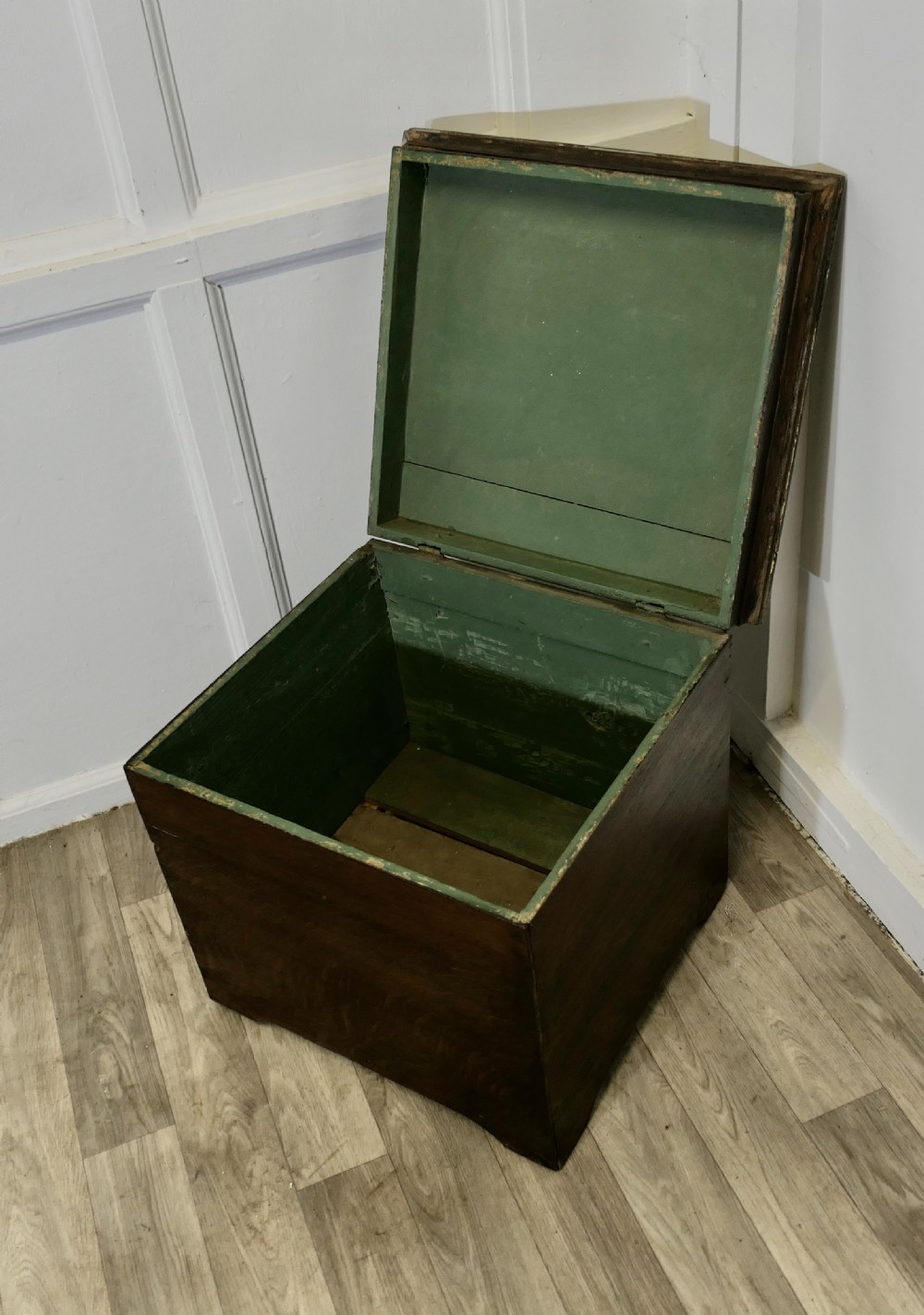 A dark oak square storage chest featuring a hinged lid open to reveal a green painted interior. View II