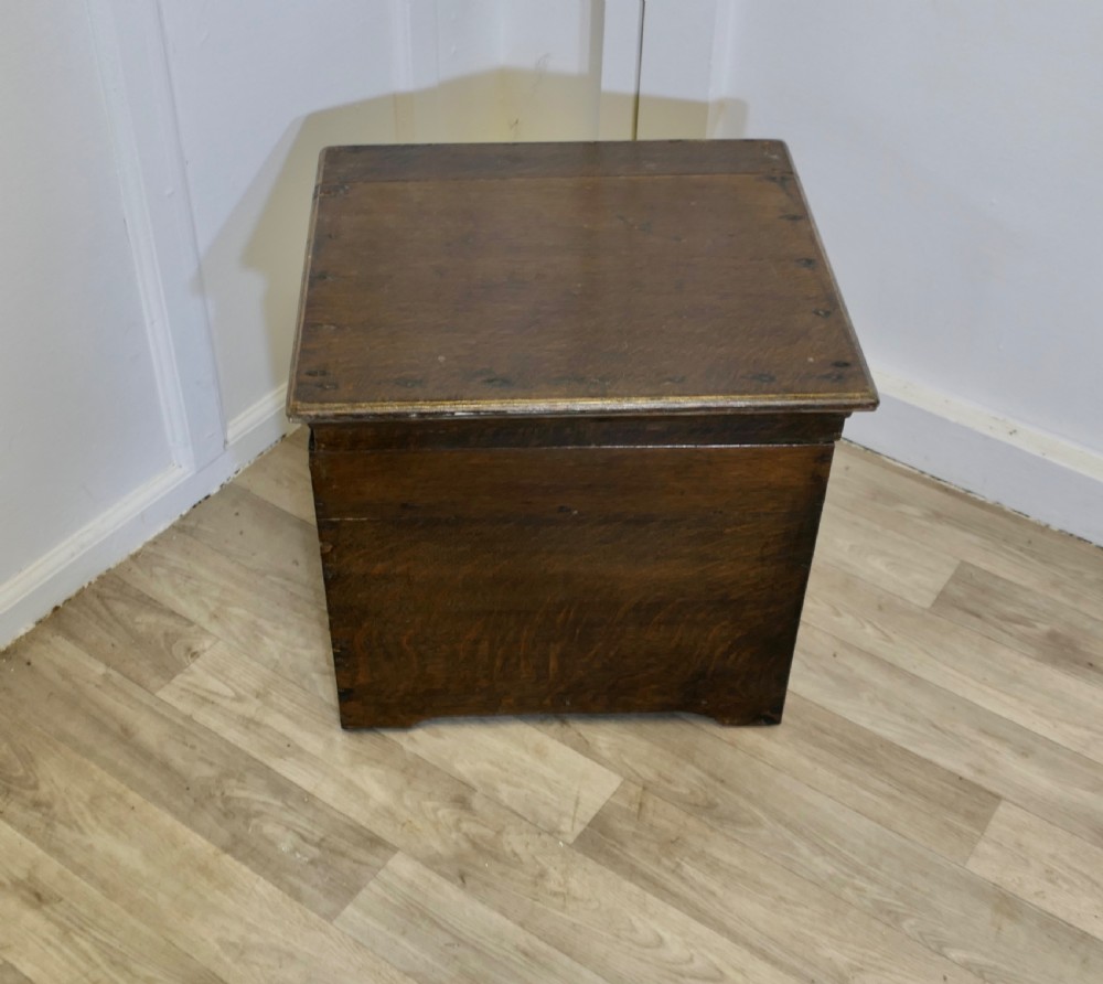 A dark oak square storage chest featuring a hinged lid open to reveal a green painted interior. View III