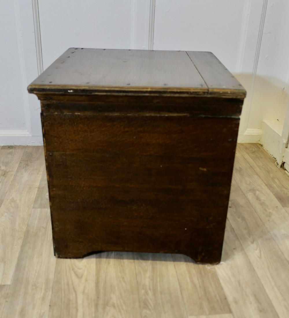 A dark oak square storage chest featuring a hinged lid open to reveal a green painted interior. View VI