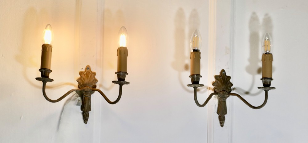 A pair of French 4 Neo Classical Metal Twin Wall Lights